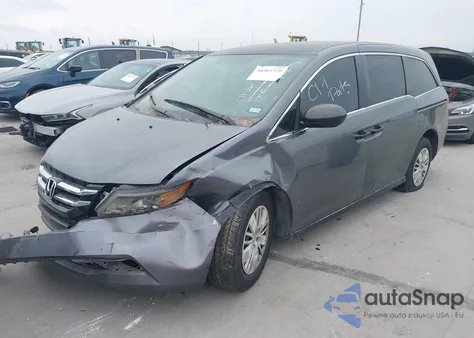 2014 Honda Odyssey Lx z USA, uszkodzony, nr VIN 5FNRL5H24EB029298
